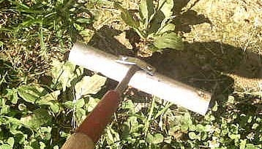 Wrenching a weed out of the ground Wrenching a weed out of the ground