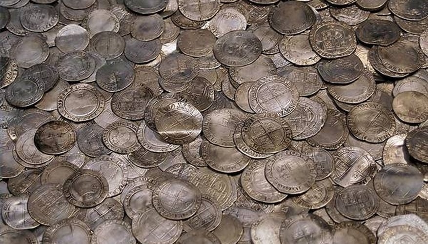 These silver coins are on display at the British Museum in London, England. These silver coins are on display at the British Museum in London, England.