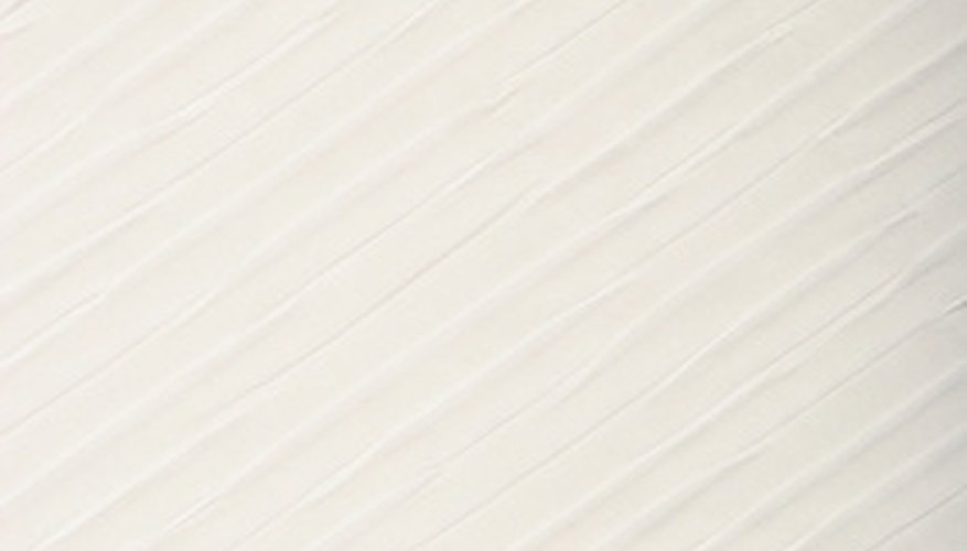 Fleas are black and will show up on a white piece of paper. Fleas are black and will show up on a white piece of paper.