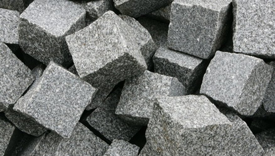 Granite blocks that break down into gravel are used in landscaping. Granite blocks that break down into gravel are used in landscaping.