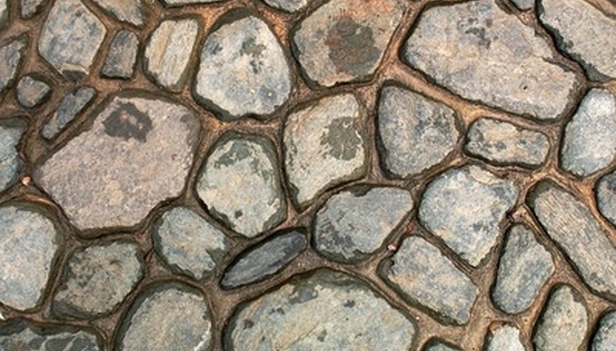 Piece flagstone together to fit its varying shapes. Piece flagstone together to fit its varying shapes.