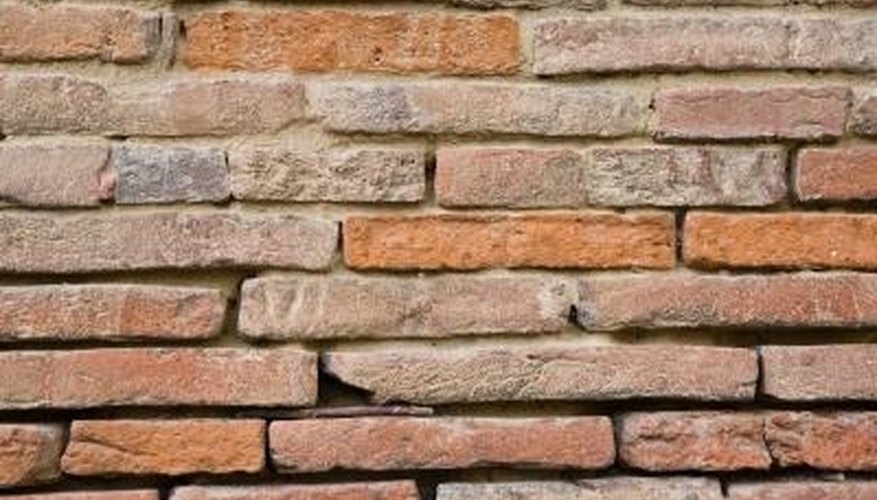 Stack pavers in a lattice pattern to ensure stability. Stack pavers in a lattice pattern to ensure stability.