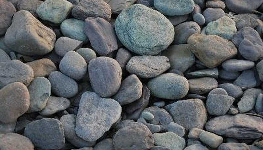 Rock gardens use plants that can handle the rocky soil. Rock gardens use plants that can handle the rocky soil.