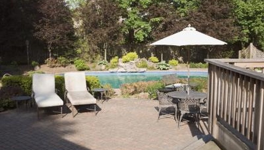 The colors and pattern of pavers lend a cozy atmosphere to a patio. The colors and pattern of pavers lend a cozy atmosphere to a patio.