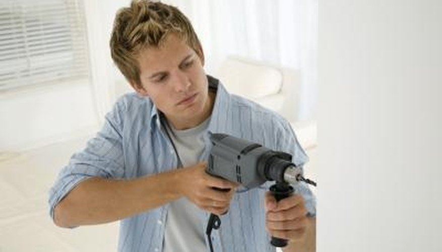 Hammer drills are required for drilling into cement. Hammer drills are required for drilling into cement.