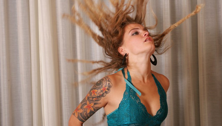 Photo Credit: sexy tattoo girl image by MAXFX from <a href='http://www.fotolia.com'>Fotolia.com</a> The flowers in this woman's tattoo were probably filled in with round shaders.