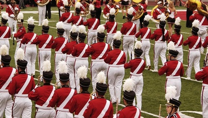A marching band in full uniform. A marching band in full uniform.