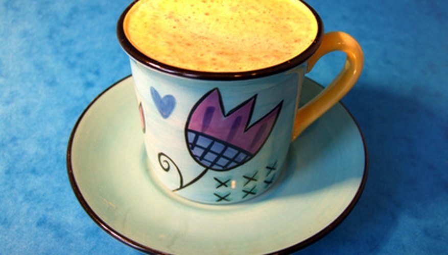 Painting your own coffee cups is a creative project with useful results. Painting your own coffee cups is a creative project with useful results.
