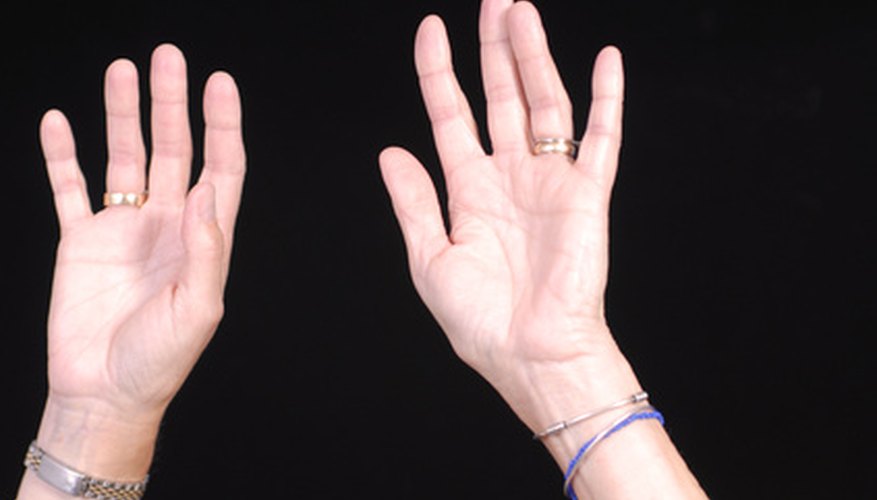 Photo Credit: hands image by jimcox40 from <a href='http://www.fotolia.com'>Fotolia.com</a> Fingers are a detail that makes your doll look more realistic.