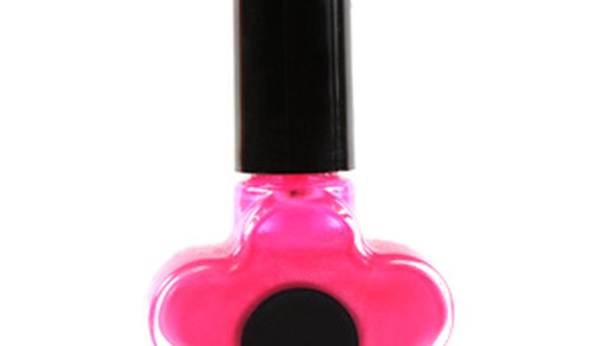 Photo Credit: pink nail polish image by Gina Smith from <a href='http://www.fotolia.com'>Fotolia.com</a> Nail Polish Spin the Bottle creates crazy nails