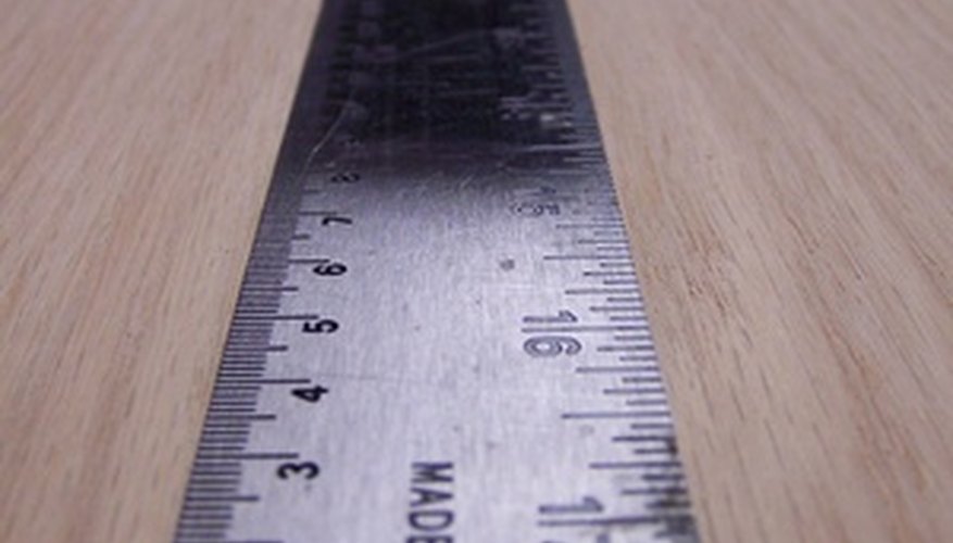 Photo Credit: steel ruler image by dwags from <a href='http://www.fotolia.com'>Fotolia.com</a> Ruler with metric (cm) markings on the left.