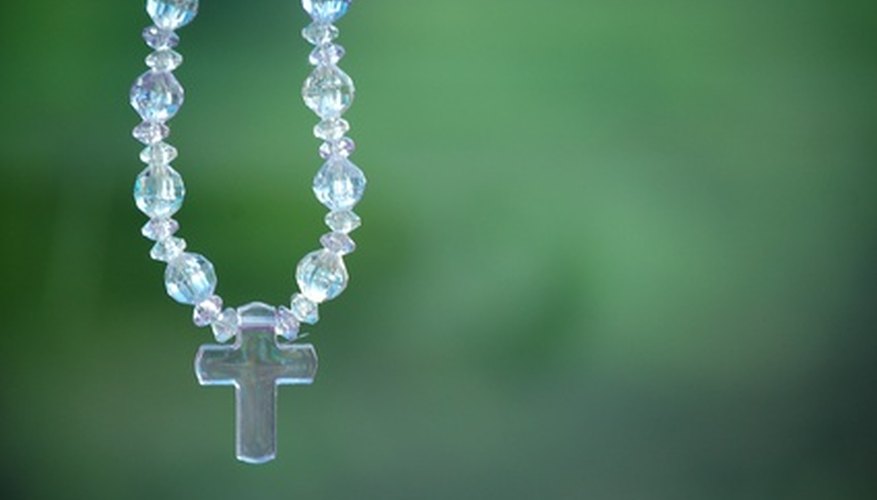 This rosary uses two spacer beads between each larger bead. This rosary uses two spacer beads between each larger bead.