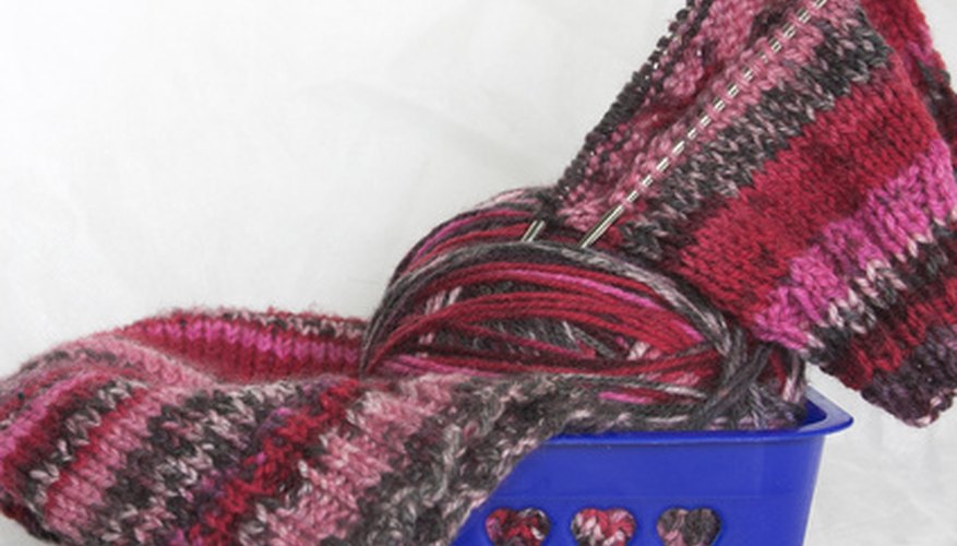 Knit a pair of bright leg warmers. Knit a pair of bright leg warmers.