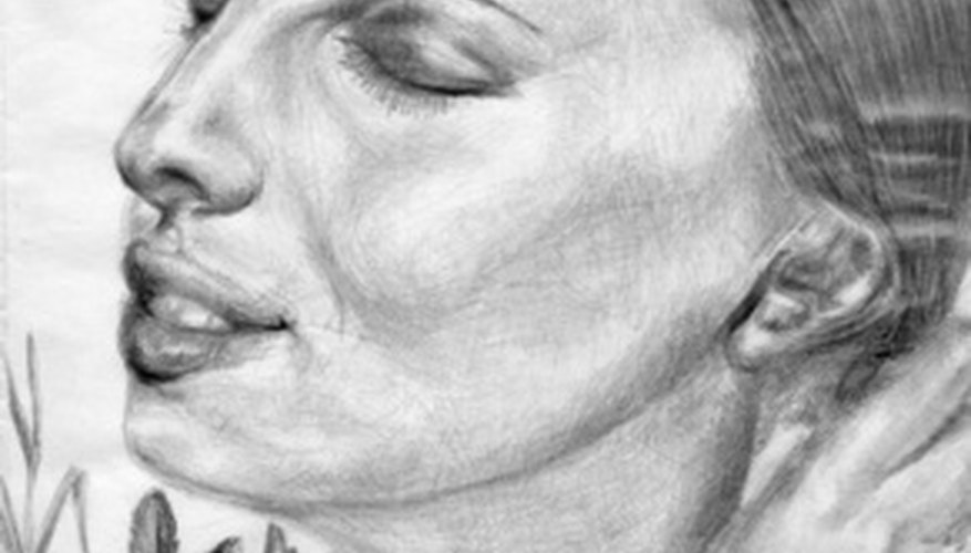 Photo Credit: portrait drawing image by PinkShot from <a href='http://www.fotolia.com'>Fotolia.com</a> The shading should cup the eye area.