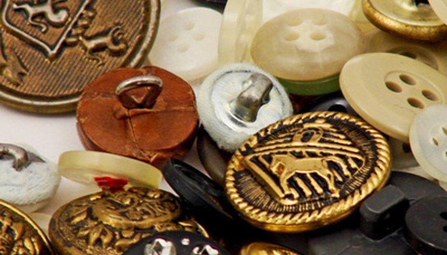 Photo Credit: assortment of buttons image by Pix by Marti from <a href='http://www.fotolia.com'>Fotolia.com</a> Organize sewing supplies into broad categories.