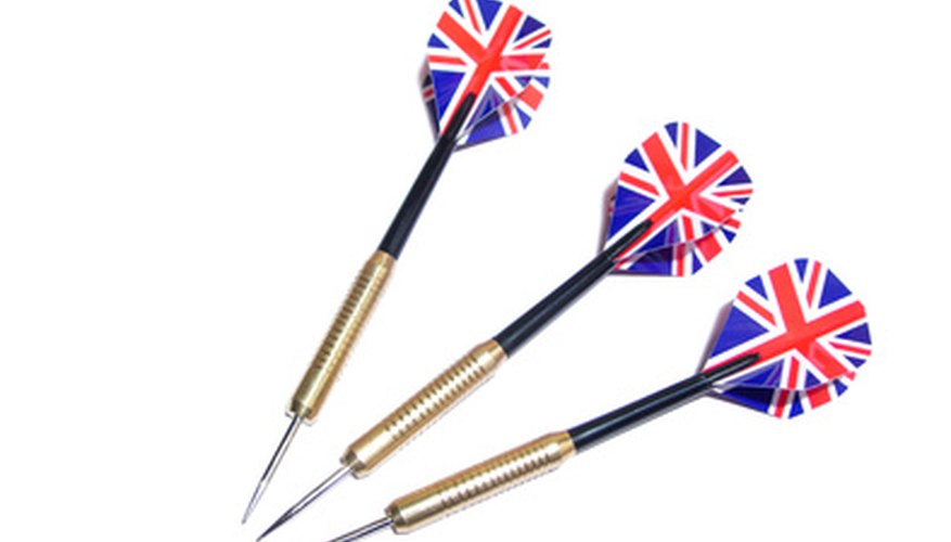 Photo Credit: 3 darts image by Aliaksei Hintau from <a href='http://www.fotolia.com'>Fotolia.com</a> Each player throws 3 darts per turn.