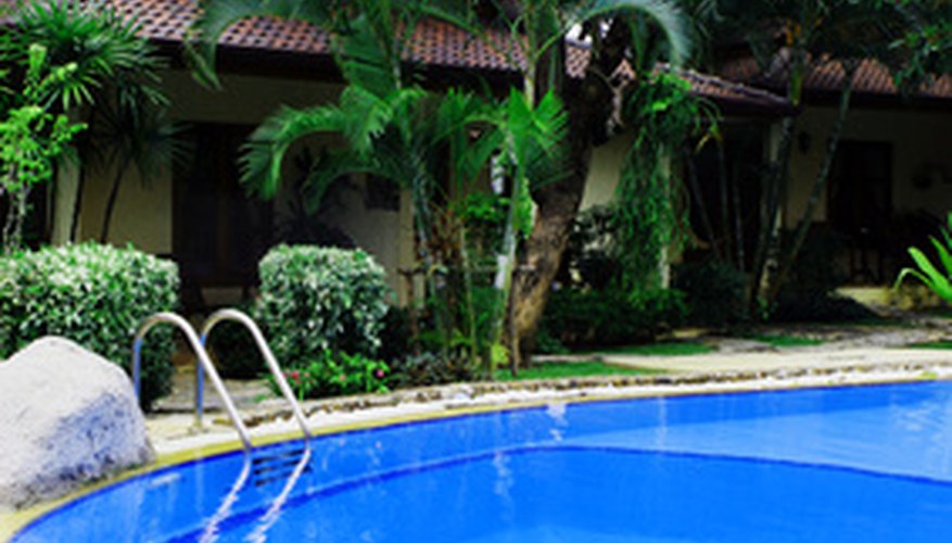 A pool house provides a place for guests to change and shower. A pool house provides a place for guests to change and shower.