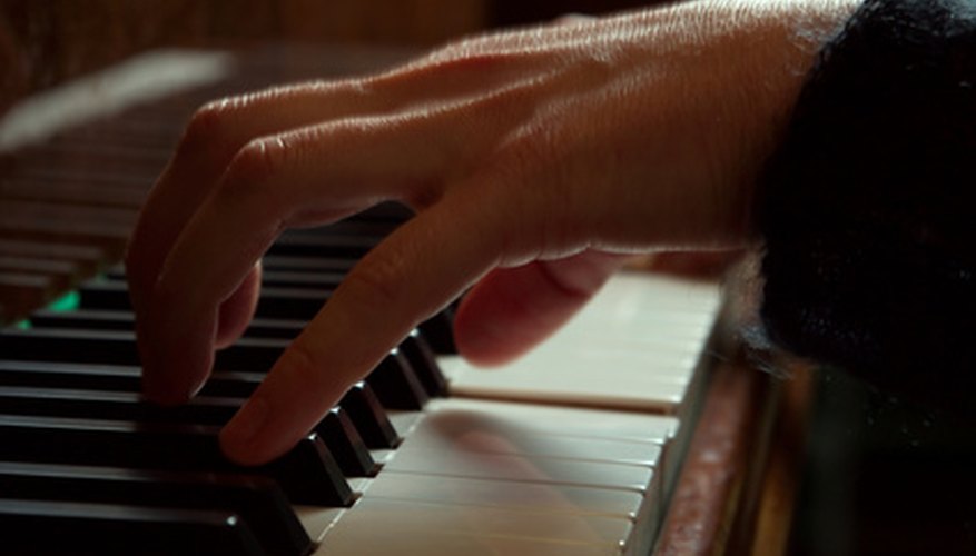 Photo Credit: piano image by Sergey Goruppa from <a href='http://www.fotolia.com'>Fotolia.com</a> Piano concertos are part of any orchestra's standard repertoire.