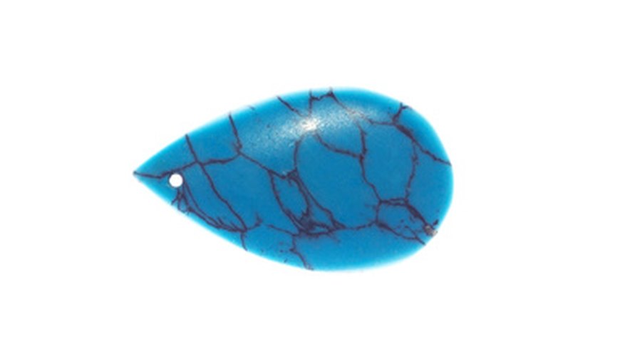 Photo Credit: turquoise image by Maxim Petrichuk from <a href='http://www.fotolia.com'>Fotolia.com</a> Turquoise rock soap looks like the real thing if made correctly.
