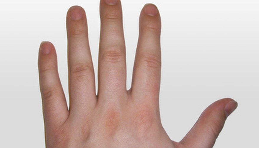 Photo Credit: Just an Arm image by Radio from <a href='http://www.fotolia.com'>Fotolia.com</a> Palm measurement