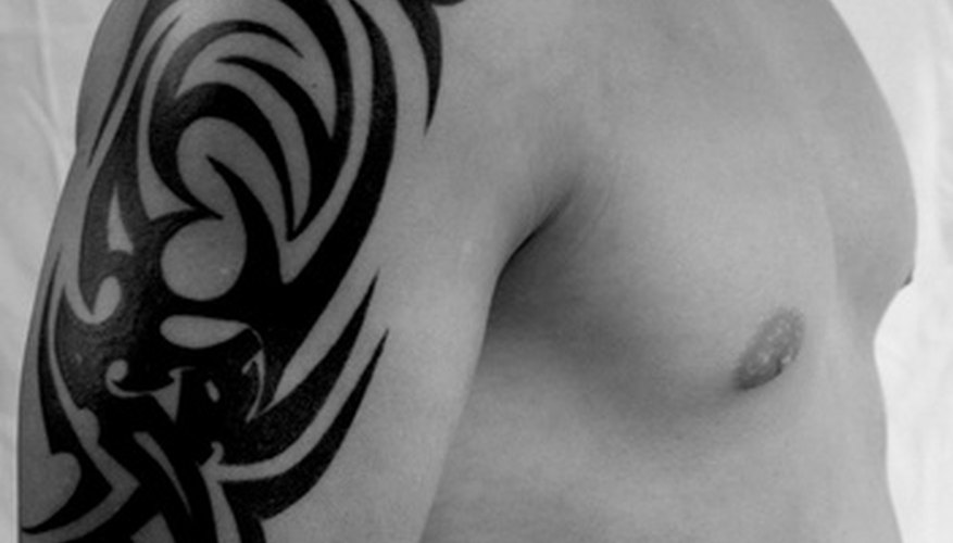 Photo Credit: tatoo image by Angelika Bentin from <a href='http://www.fotolia.com'>Fotolia.com</a> If you create an adult male, you do not need to define the chest as much as you would a female.