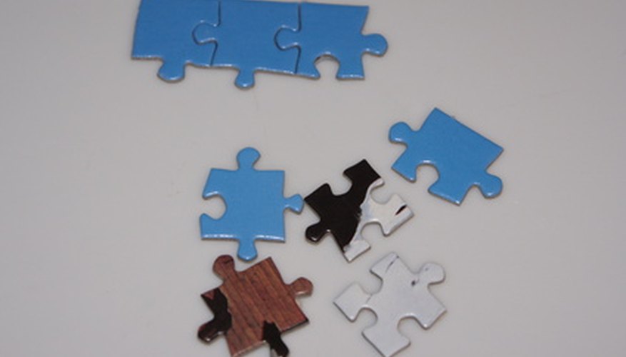 Photo Credit: puzzle image by Pablo Armelles from <a href='http://www.fotolia.com'>Fotolia.com</a> Create a puzzle to suit various ages of children.