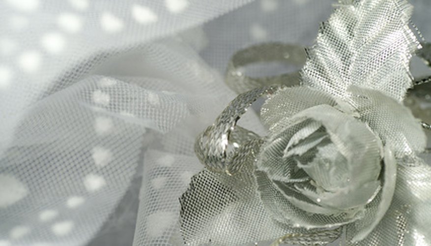 Use tulle for a pretty corsage. Use tulle for a pretty corsage.