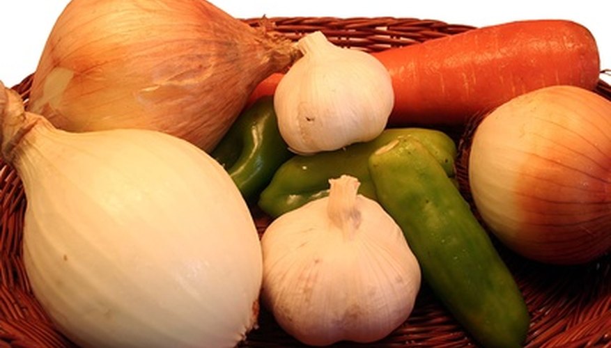 Grow a variety of vegetables in a container garden. Grow a variety of vegetables in a container garden.