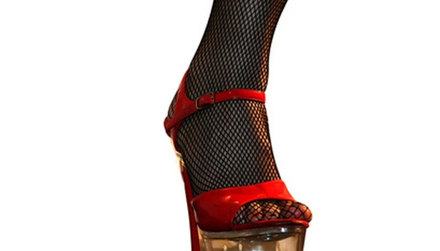 Photo Credit: high heels image by Snezana Skundric from <a href='http://www.fotolia.com'>Fotolia.com</a> Practice walking in platforms before dancing.