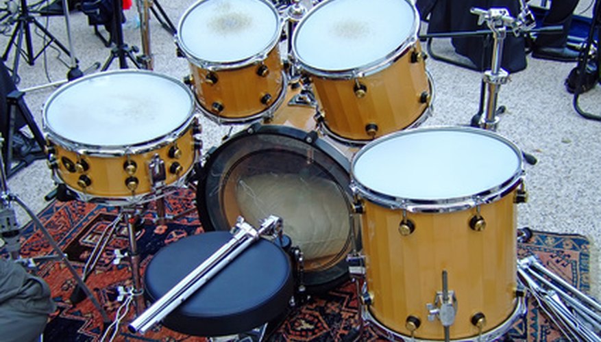 Photo Credit: drums image by agno_agnus from <a href='http://www.fotolia.com'>Fotolia.com</a> A drum beat is an essential part of pop songs.