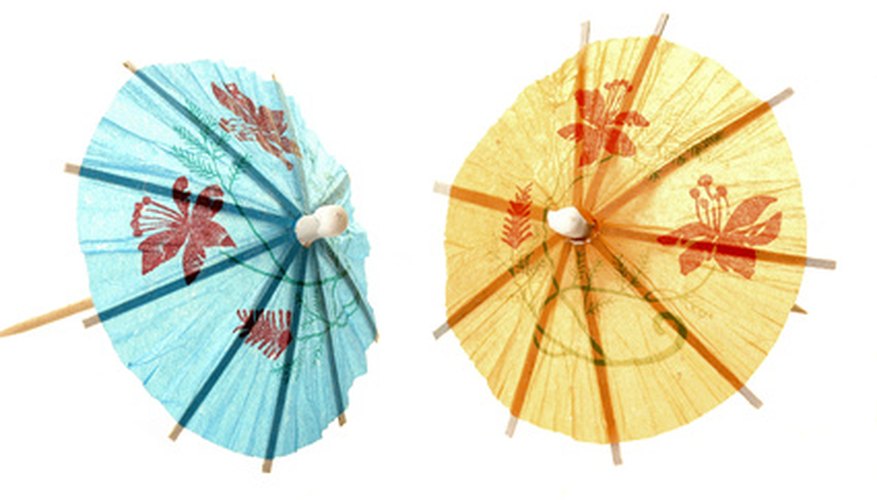 Paper umbrellas add an accent to a mixed drink. Paper umbrellas add an accent to a mixed drink.