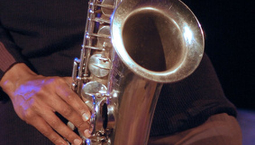 Photo Credit: saxophone image by SADIA from <a href='http://www.fotolia.com'>Fotolia.com</a> The wind-driven saxophone adds a sultry sound.
