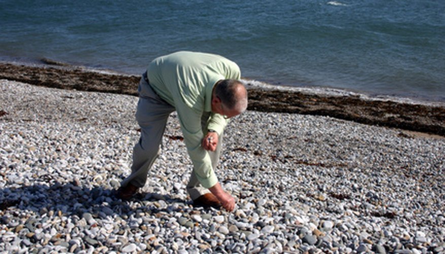 Photo Credit: Collecting Pebbels image by Andrew Breeden from <a href='http://www.fotolia.com'>Fotolia.com</a> Wear comfortable shoes to search for agate.