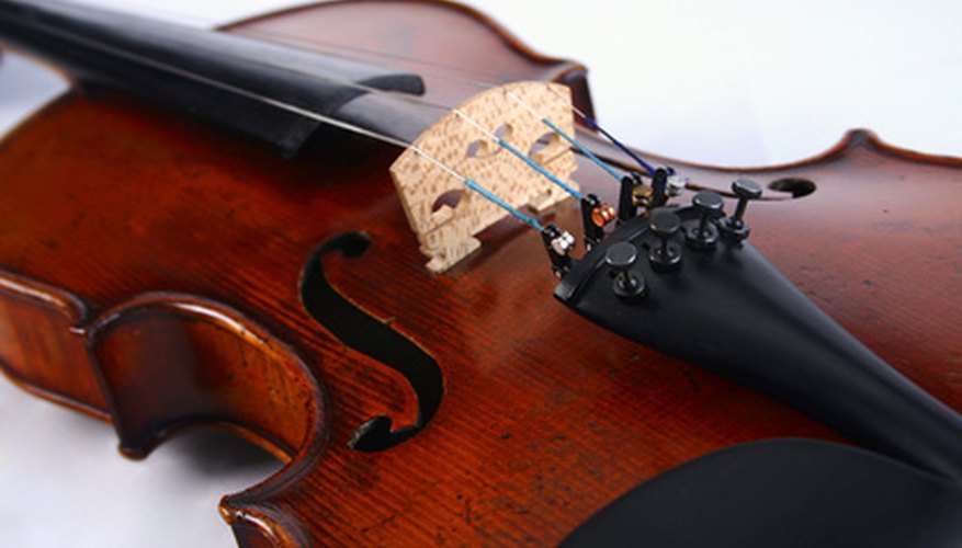 Photo Credit: full violin image by Sergey Goruppa from <a href='http://www.fotolia.com'>Fotolia.com</a> Violin.