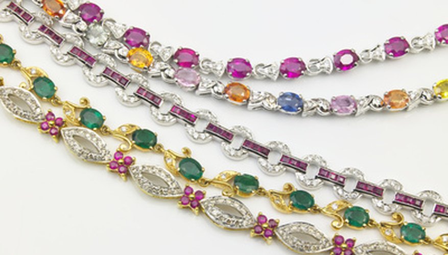 Photo Credit: gems bracelets image by OMKAR A.V from <a href='http://www.fotolia.com'>Fotolia.com</a> Gems are used in jewelry, including bracelets.