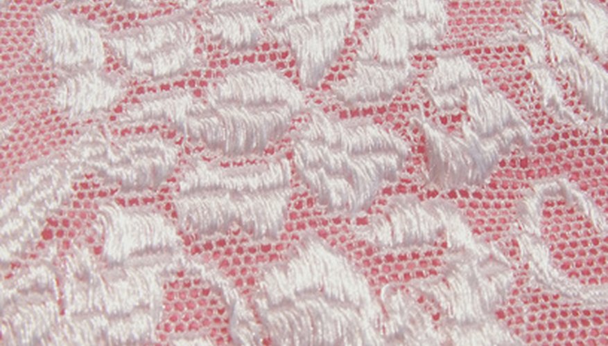 Lace fabric makes a lovely overlay for dresses and other garments. Lace fabric makes a lovely overlay for dresses and other garments.