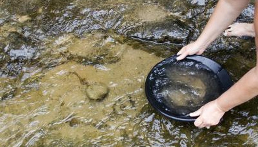 Photo Credit: Robert Gubbins/iStock/Getty Images Gold panning in creek