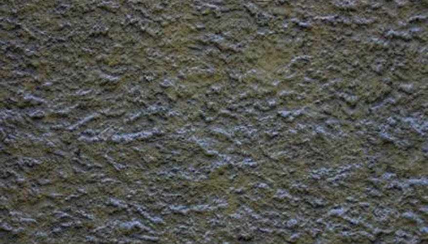 A slightly textured stucco application helps disguise boring concrete retaining walls. A slightly textured stucco application helps disguise boring concrete retaining walls.