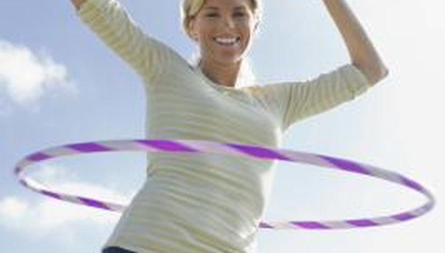 Adults can have fun with hula hoops. Adults can have fun with hula hoops.
