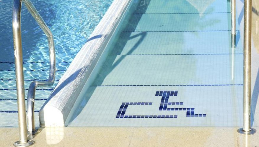 A handicapped ramp at a swimming pool. A handicapped ramp at a swimming pool.