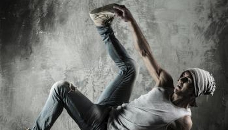 Young man doing break dancing moves Young man doing break dancing moves
