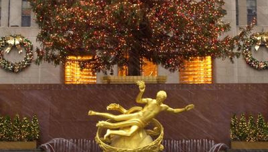 Photo Credit: Chris Hondros/Hulton Archive/Getty Images Statue of Prometheus hovers over Rockefeller Center