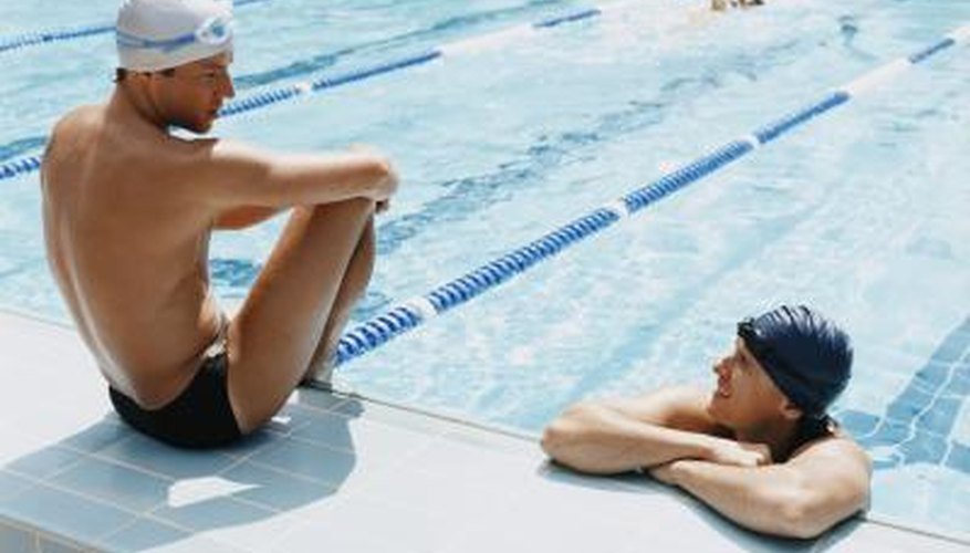 People hanging out in the pool. People hanging out in the pool.