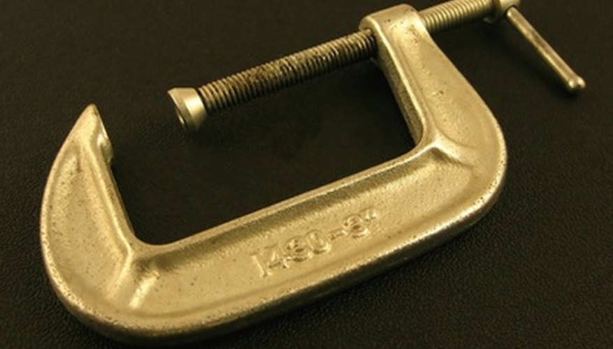 Adjustable C-clamps hold thin or narrow parts together until they are permanently secured. Adjustable C-clamps hold thin or narrow parts together until they are permanently secured.