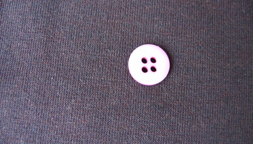 A button or other small object works well for this game. A button or other small object works well for this game.