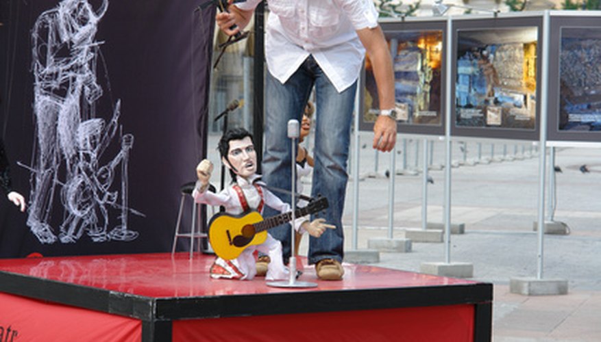 Elvis Presley has been represented in all kinds of souvenirs, such as puppets (as here) and stamps. Elvis Presley has been represented in all kinds of souvenirs, such as puppets (as here) and stamps.