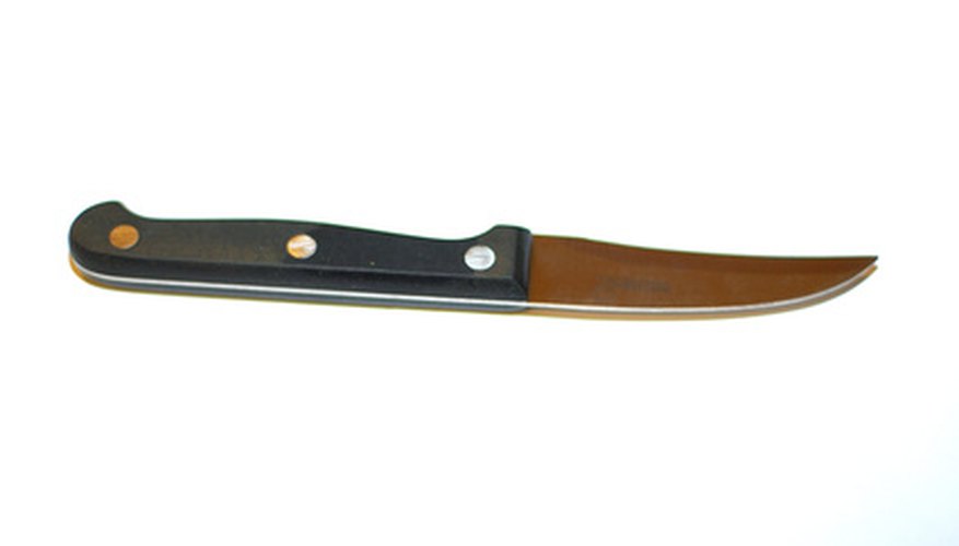 Use a paring knife, not a peeler, to get the wax off of yucca root. Use a paring knife, not a peeler, to get the wax off of yucca root.