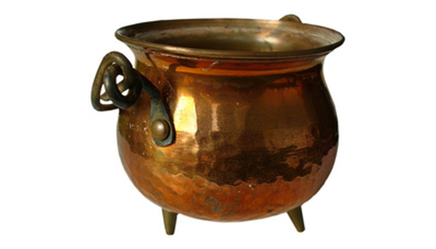 Photo Credit: Rustic copper pot, isolated on white image by Accent from <a href='http://www.fotolia.com'>Fotolia.com</a> This copper kettle would make a perfect subject for engraving.