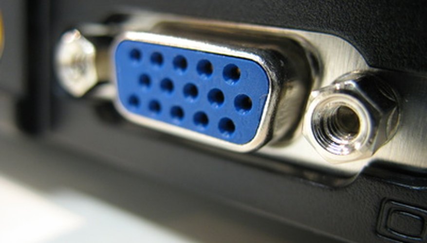 Photo Credit: vga image by MATTHIEU FABISIAK from <a href='http://www.fotolia.com'>Fotolia.com</a> The VGA port will be identical on both devices.