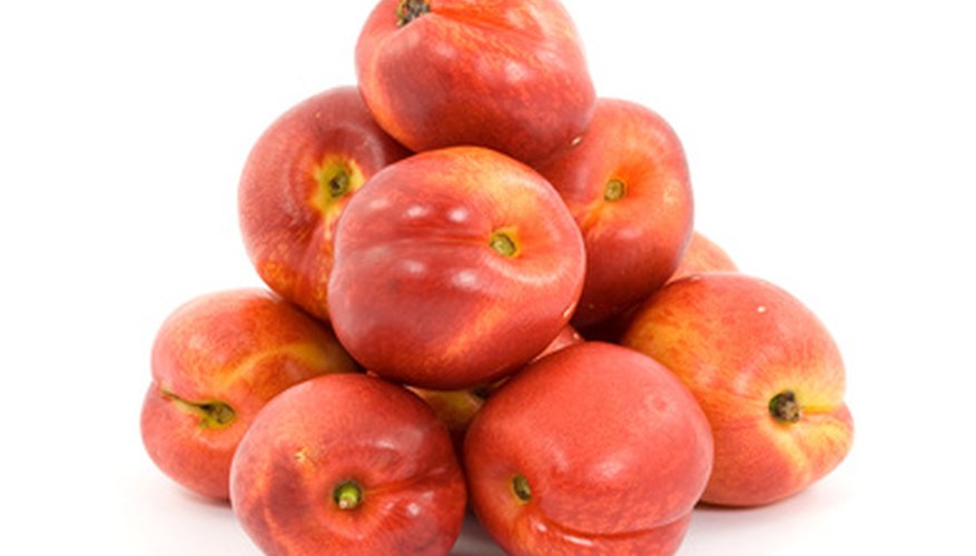 Several peach tree varieties are appropriate for Texas gardens. Several peach tree varieties are appropriate for Texas gardens.